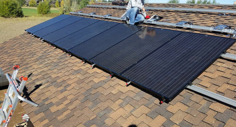 Solar Tools: Solar Panel Hanger Set being used by a Solar Panel installer on a roof