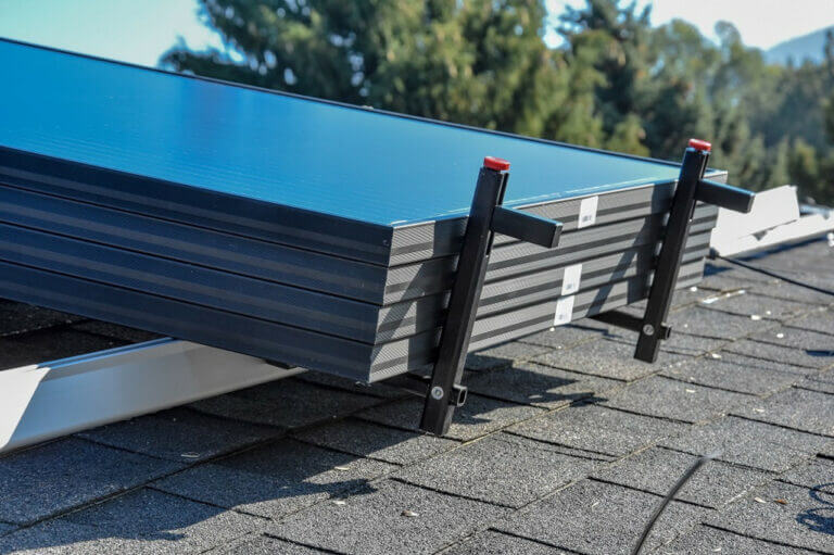 Solar Tools: Solar Panel Hanger Set holding solar panels on a roof