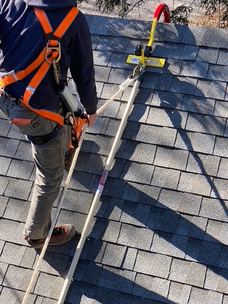 TRP on roof with worker