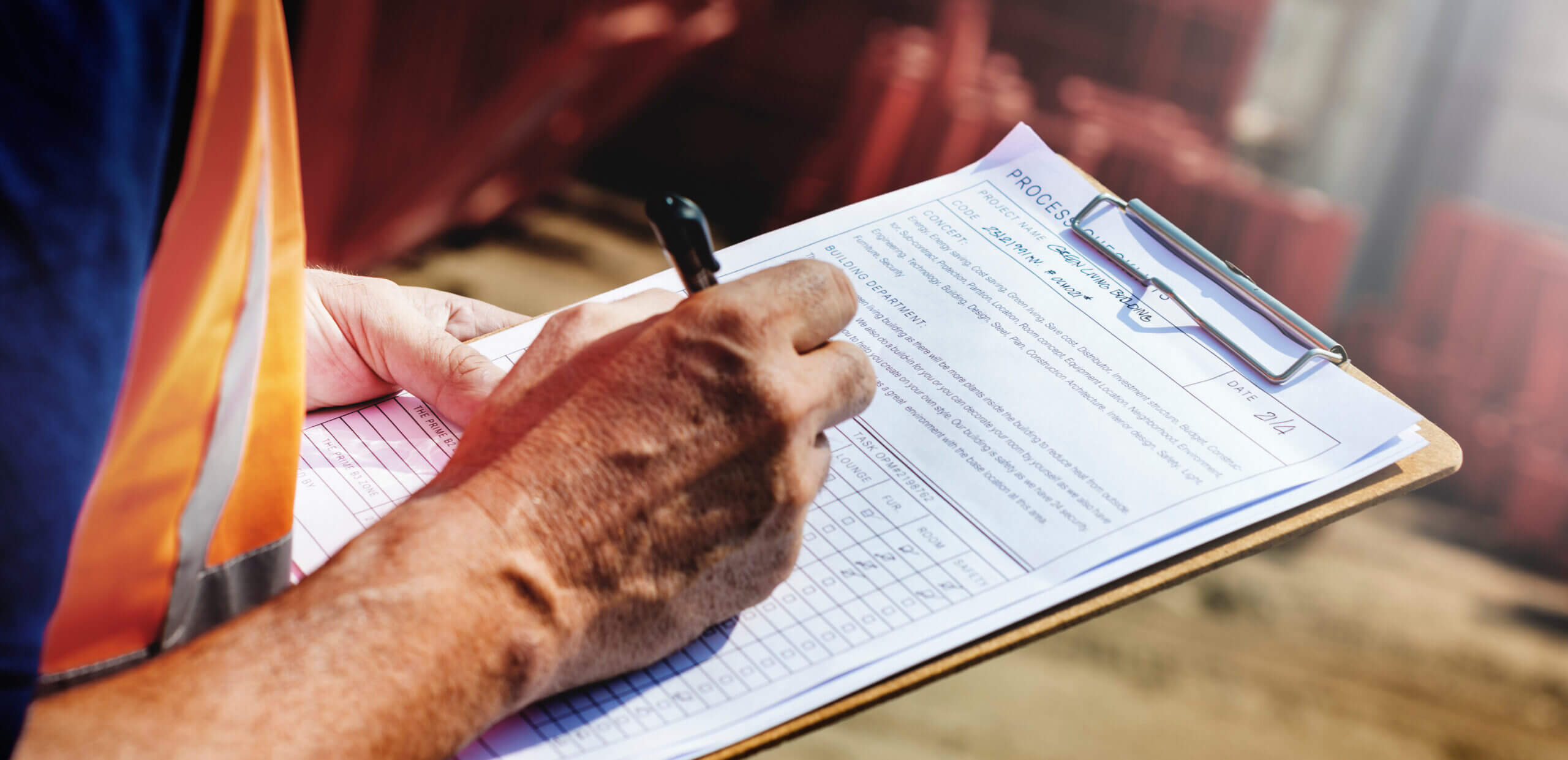 Insurance claims adjuster with clipboard